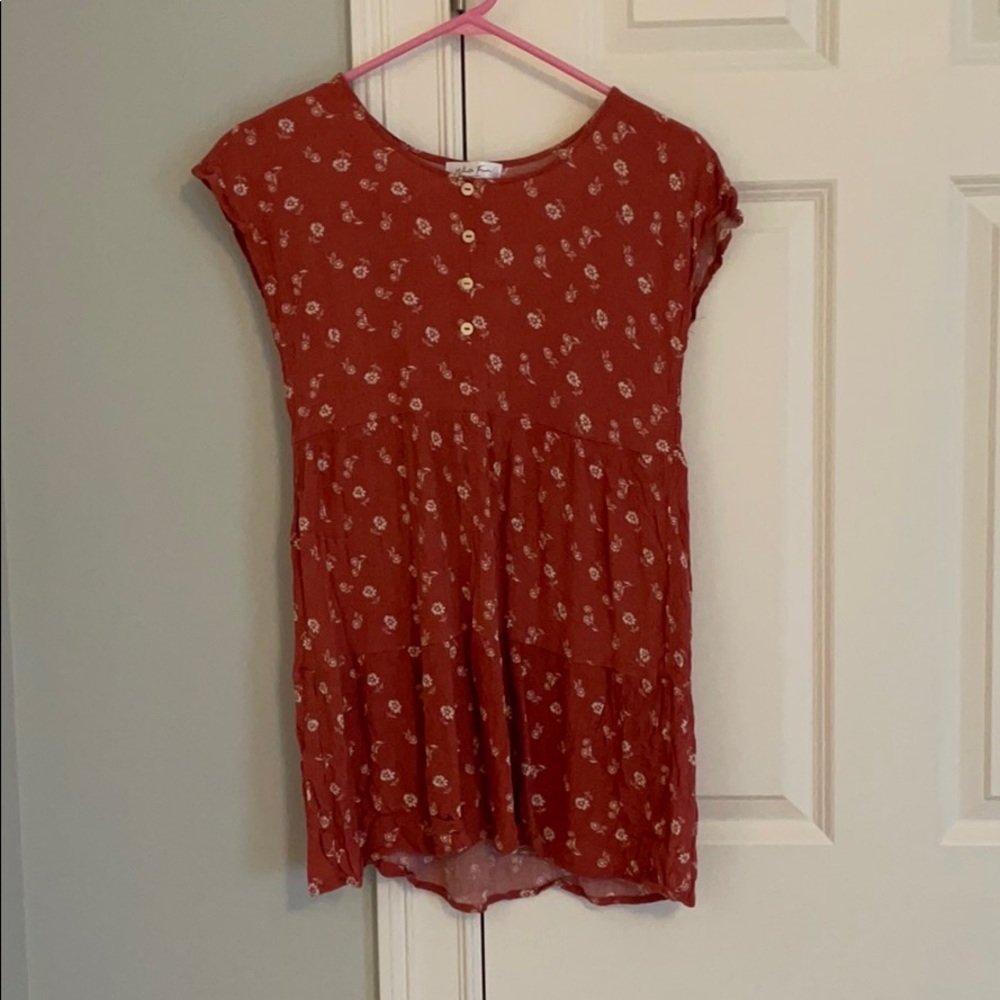 White fawn ditzy girls rust baby doll dress.